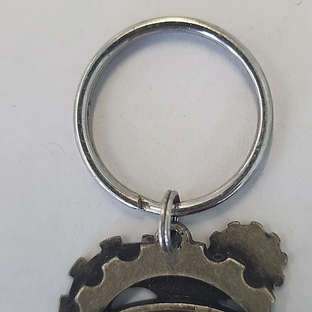 WORLDS OF FUN KEYCHAIN KEYRING HAUNT 2017 AMUSEMENT PARK RIDES STEAMPUNK